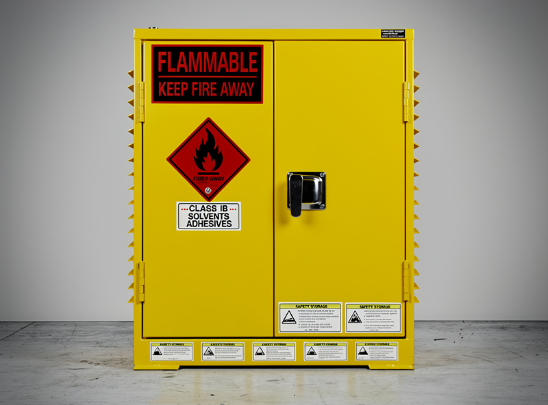 Flammable storage cabinet for leather solvents and adhesives with safety labels