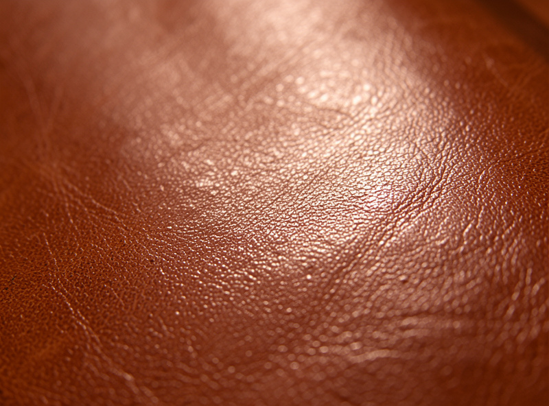 Close-up of smooth tight full-grain natural vegetable-tanned leather suitable for tooling